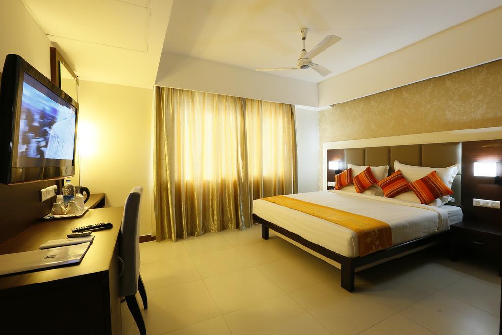 Hotel Moonlit Regency Thodupuzha Szoba fotó