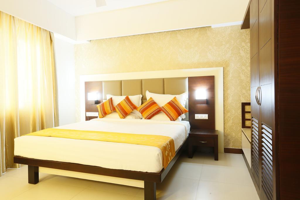 Hotel Moonlit Regency Thodupuzha Szoba fotó